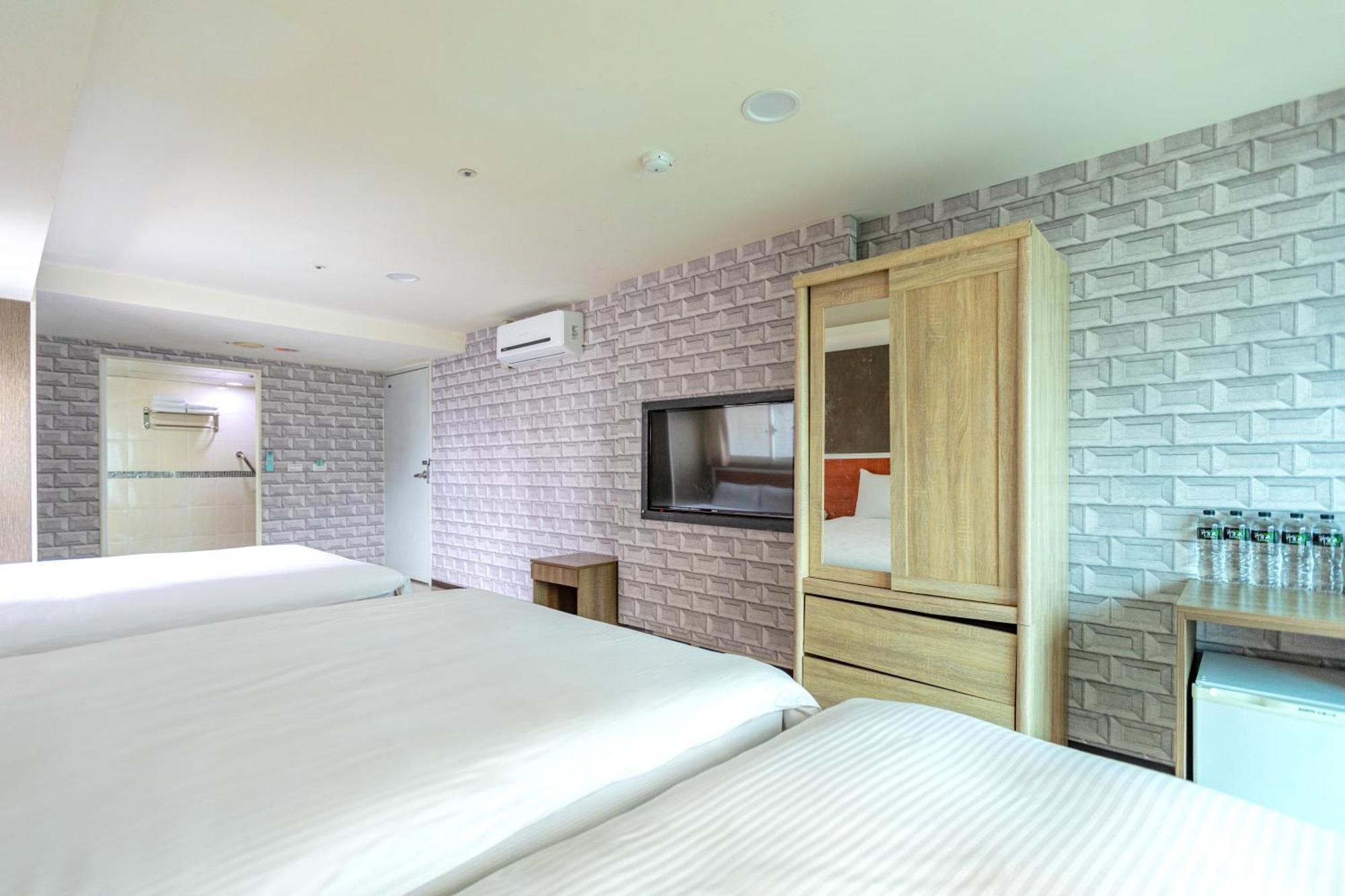 E Lim Hotel Zhongli Quarto foto